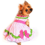 Your dog will be a cool sweet treat on a warm day wearing this Watermelon Dog Harness Dress!  Cheerful patterns and colors Watermelon collar theme Reinforced D-ring for use as a harness (leash sold separately) Easy touch fastener application at neck and chest 100% polyester